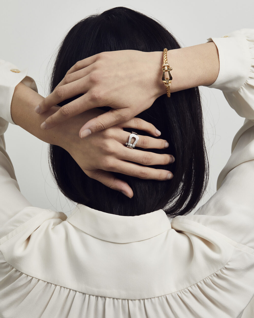 fred force 10 on a woman's wrist