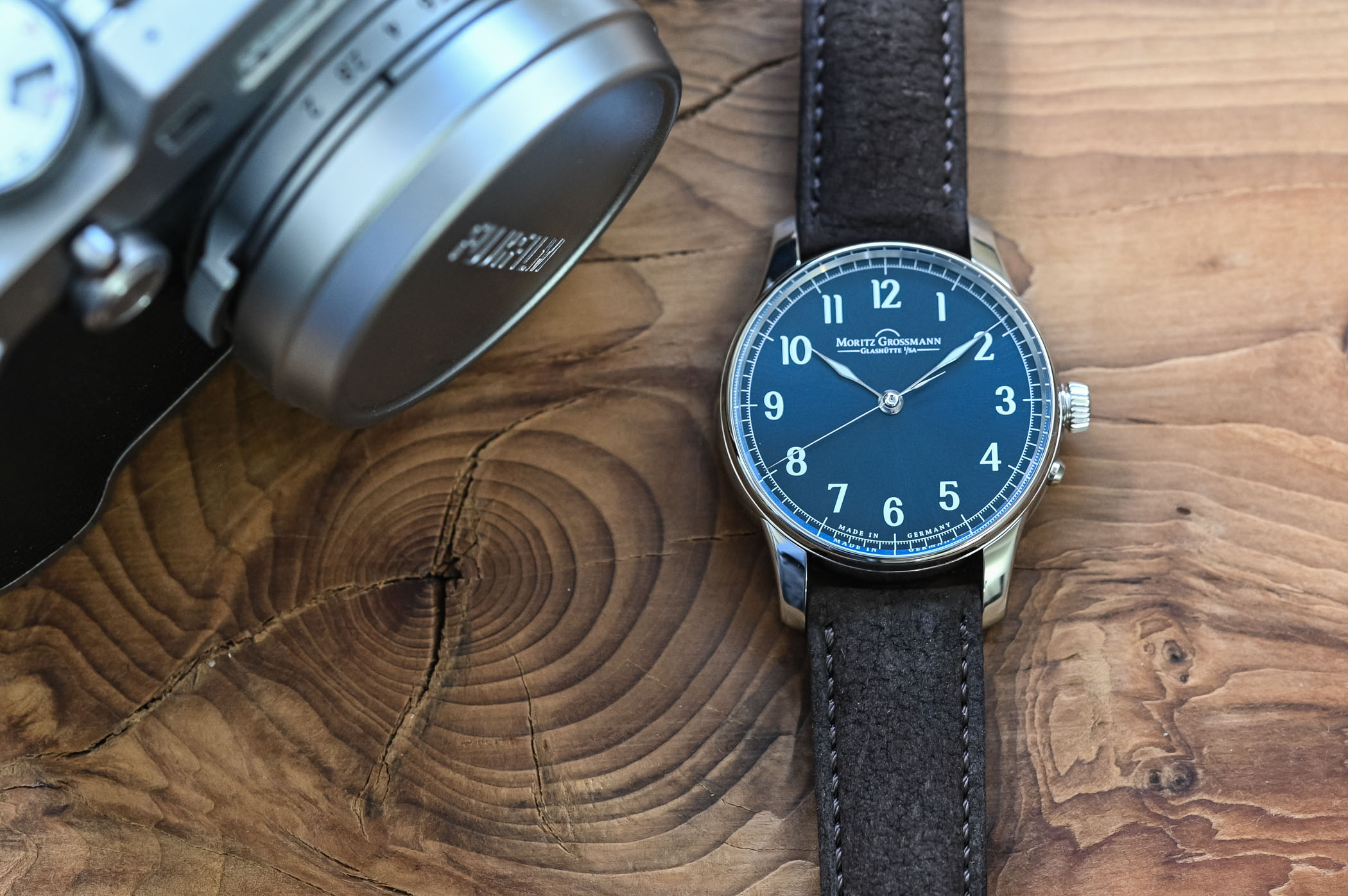 moritz grossmann central second blue on a table with a camera